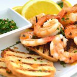 Savor Garlic Shrimp Tapas: Perfect Side with Crispy Bread